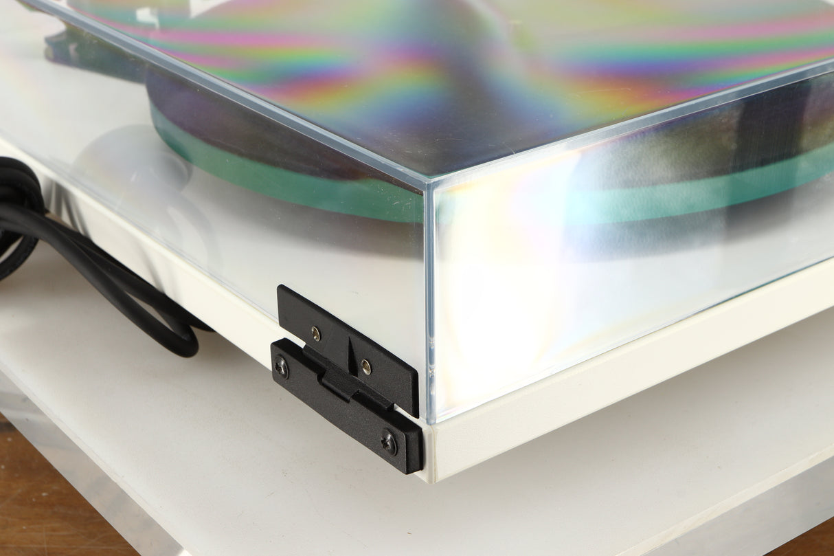 Rear left corner of a used Rega RP3 / Exact Cartridge in a white finish