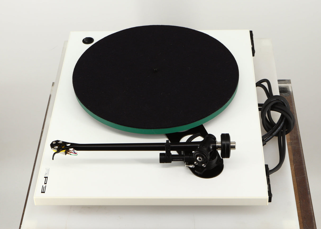 Right side view of a used Rega RP3 / Exact Cartridge in a white finish