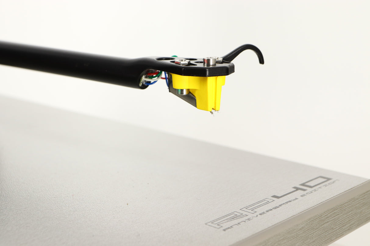 Close up of a used Rega RP40 Anniversary Edition Turntable / Exact Cartridge in a titanium finish showing stylus