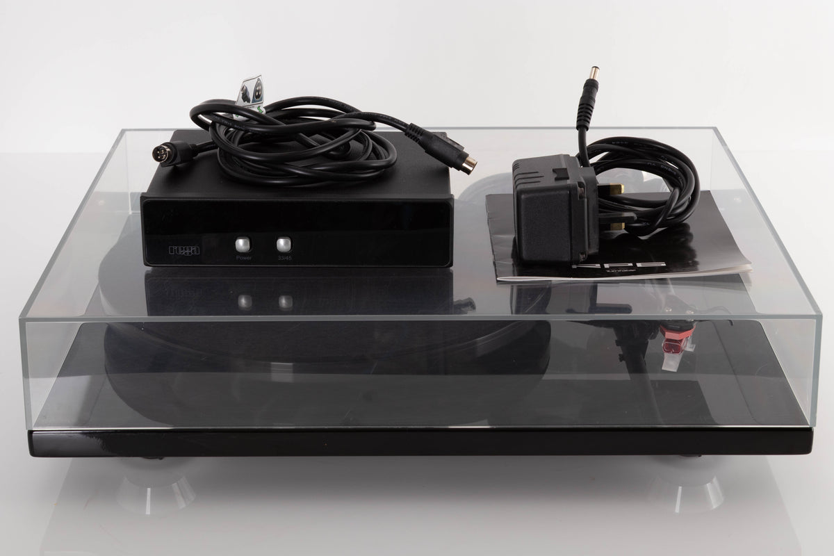 Front view of a used Rega RP6 Turntable in Black with Dynavector DV-10 X5 Cartridge, TTPSU, Mains Cable, and PSU Cable