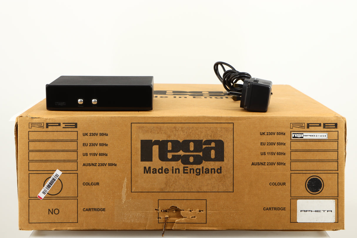 Box for a used Rega RP8 Turntable / Apheta 2 MC Cartridge in a black finish showing Rega TTPSU and Power Supply