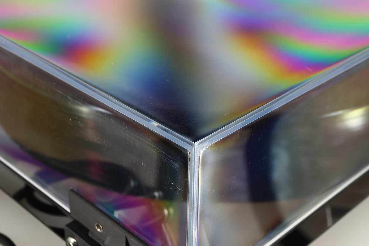 Close up of a used Rega RP8 Turntable / Apheta 2 MC Cartridge in a black finish showing scratching on lid
