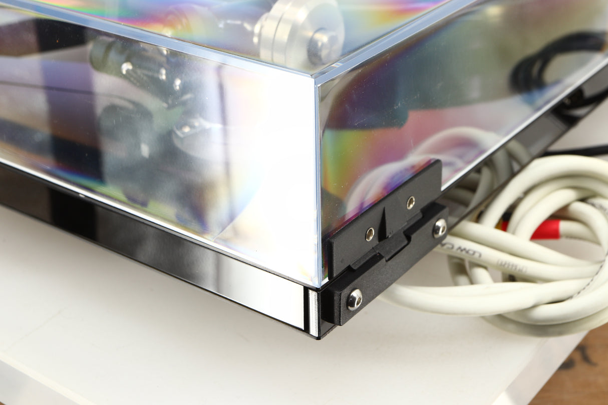 Rear right corner of a used Rega RP8 Turntable / Apheta 2 MC Cartridge in a black finish