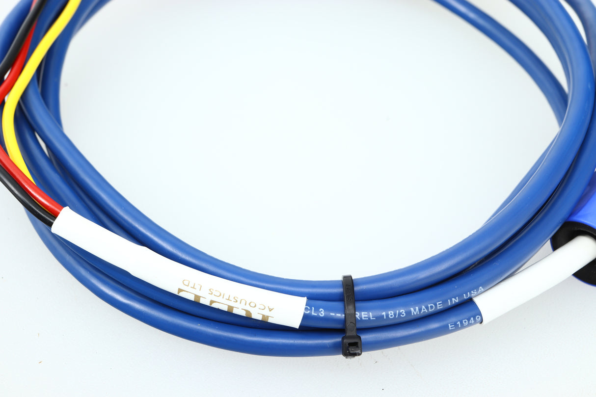 Close up of a used REL Baseline Blue 3.0m Subwoofer Cable showing the logo