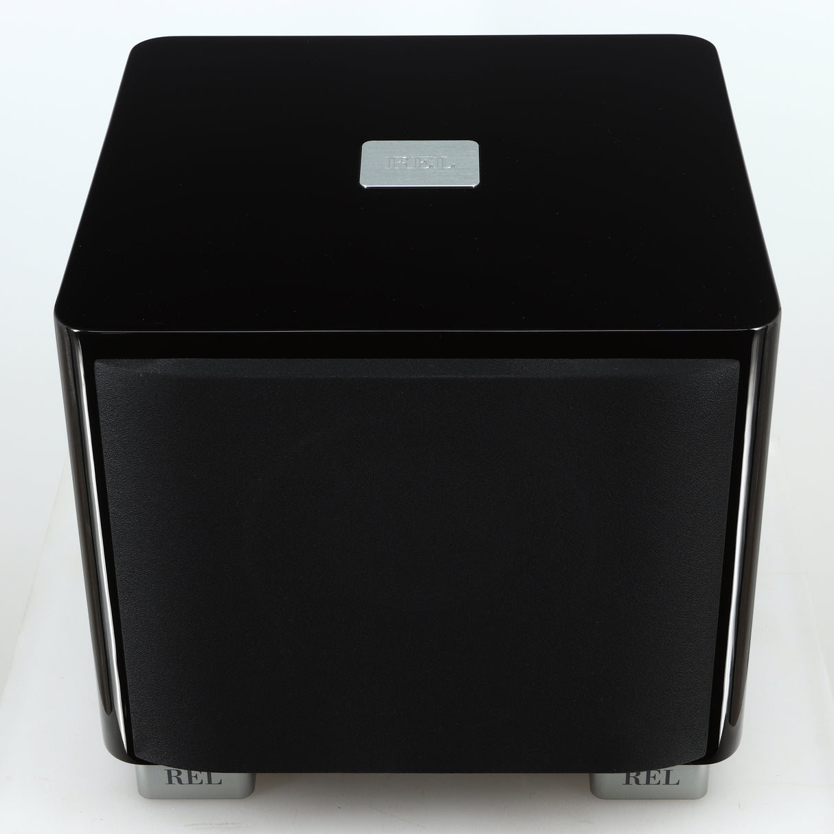 Top of a used REL T-7X Subwoofer in a piano black finish