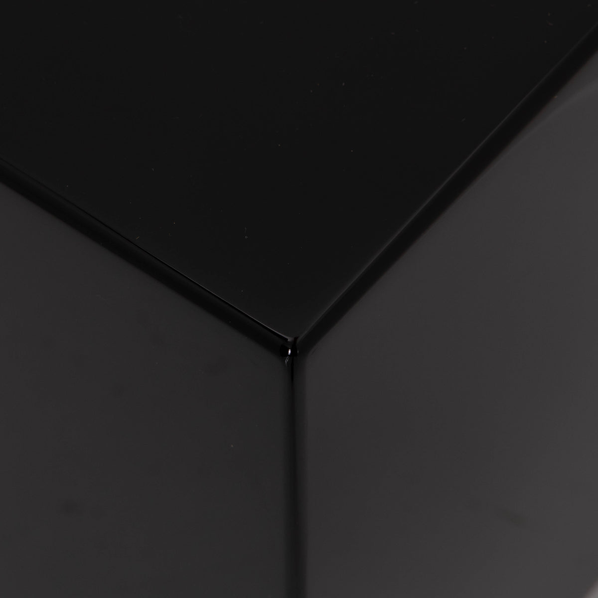 Front left corner of a used REL T-Zero Subwoofer in a Piano Black finish