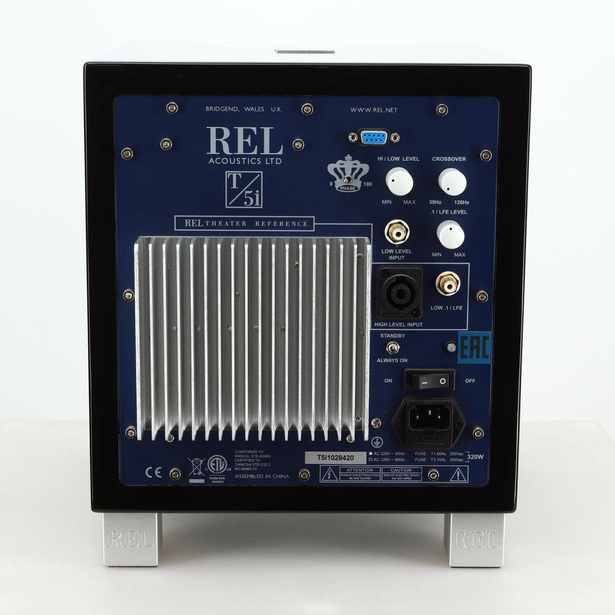 Rear view of a REL T5i Subwoofer with a piano black finish showing High Level Input, Low Level Input and Mains Input