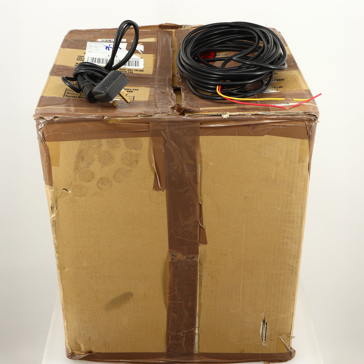 Box for a used REL T5i Subwoofer W/ Upgraded Feet in a piano black finish showing Hi-Level Cable and Mains Cable