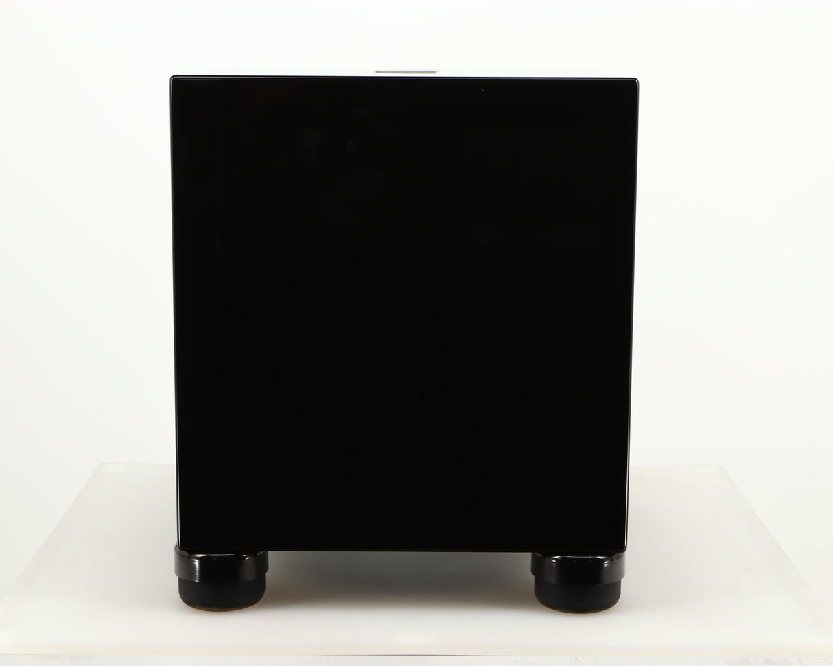 Front view of a used REL T5i Subwoofer W/ Upgraded Feet in a piano black finish