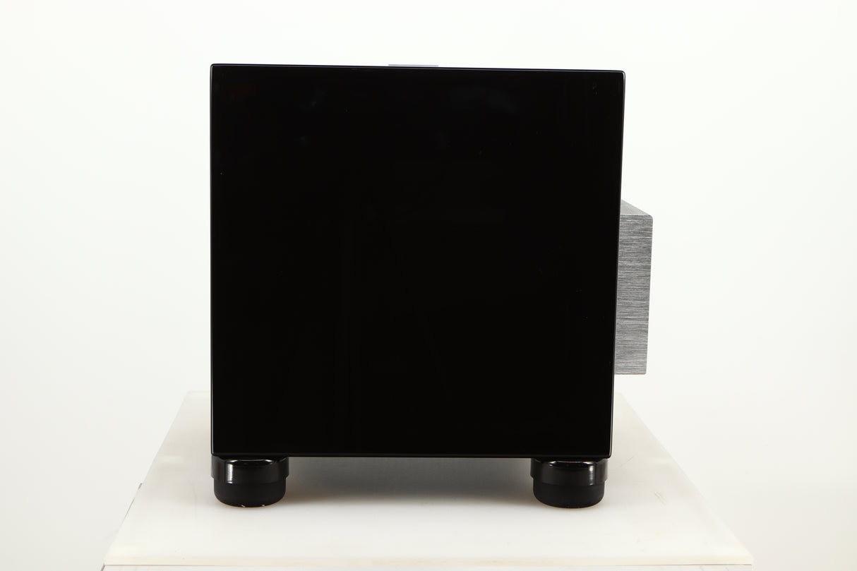 Side view of a used REL T5i Subwoofer in Piano Black finish with Upgrade Feet