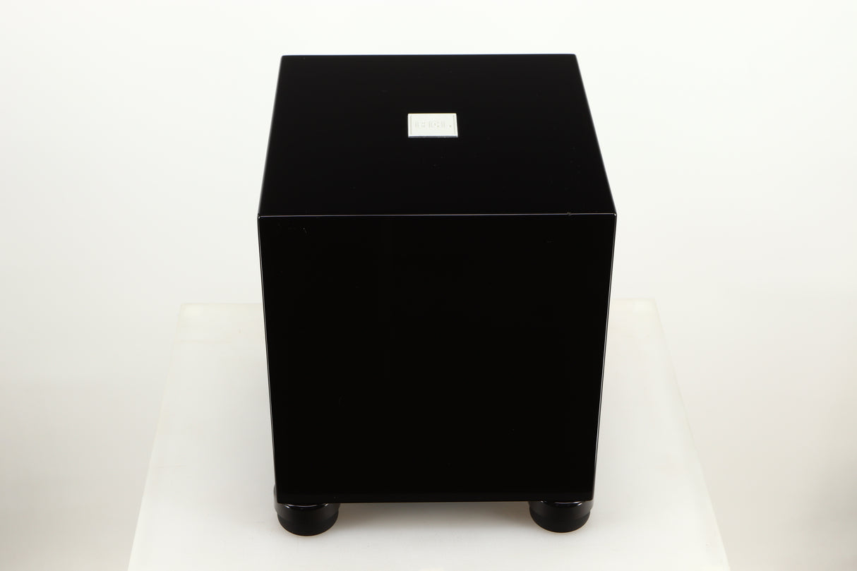 Top view of a used REL T5i Subwoofer in Piano Black finish with Upgrade Feet