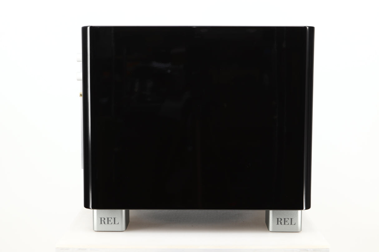 Side view of a used REL T9X Subwoofer in Piano Black finish
