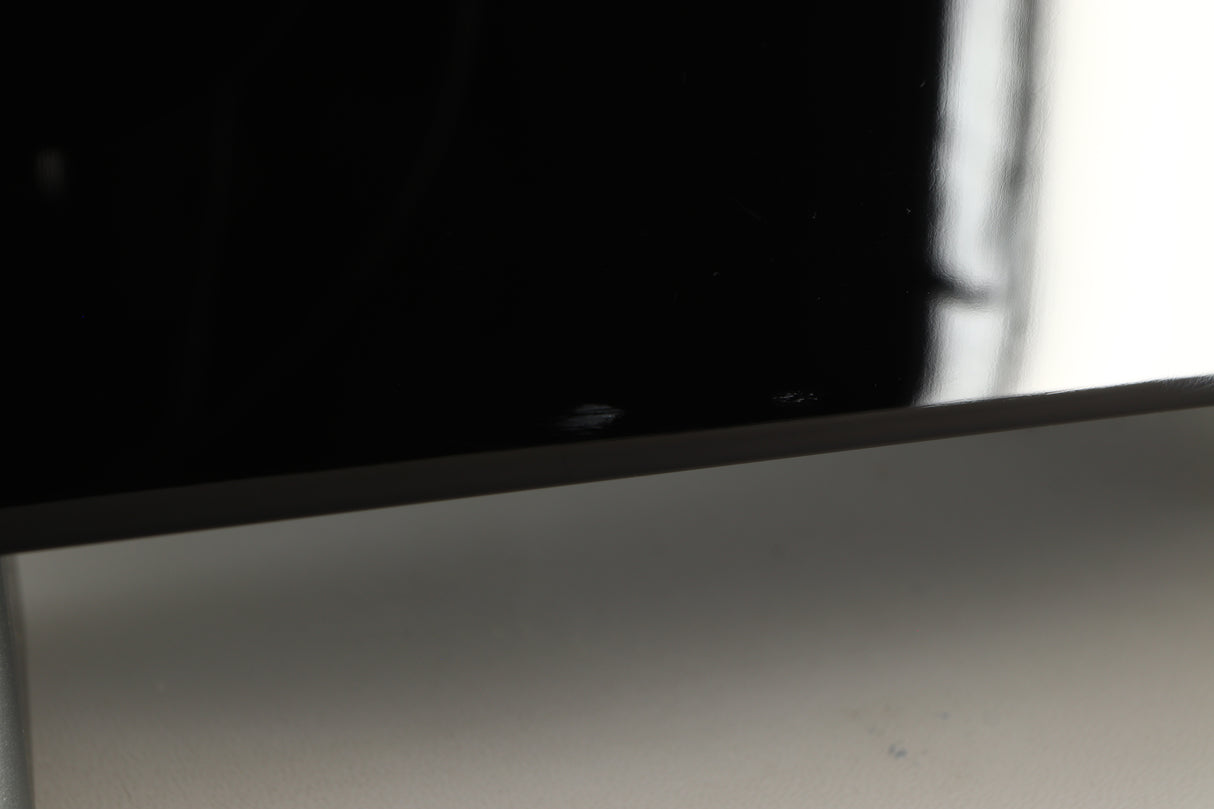 Close up view of a used REL T5X Subwoofer in Piano Black finish