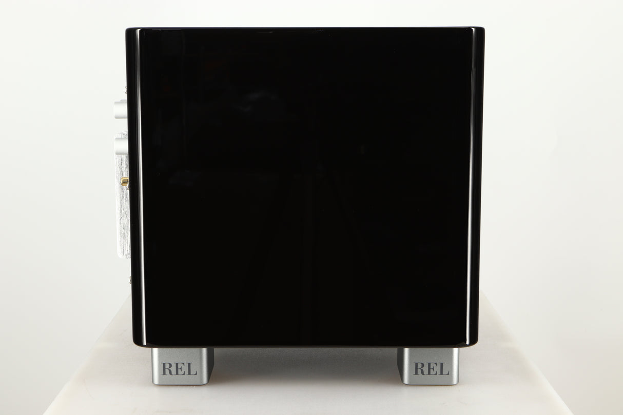 Side view of a used REL T5X Subwoofer in Piano Black finish