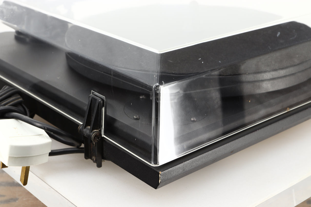Rear left corner of a used Revolver Rebel Turntable / AT95E Cartridge in a black finish
