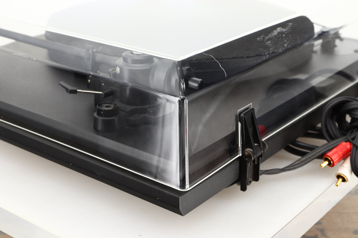 Rear right corner of a used Revolver Rebel Turntable / AT95E Cartridge in a black finish