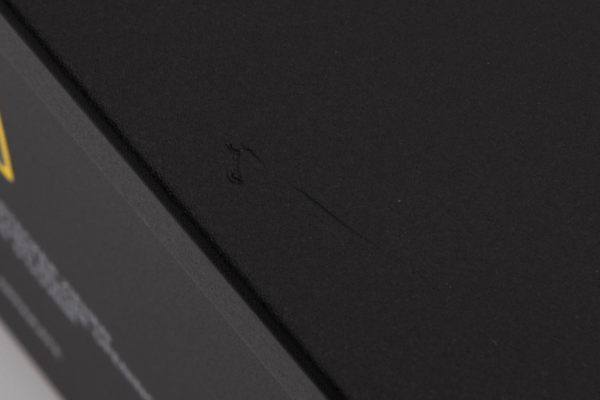 Close up of a used Revox C221 CD Player in a Black finish showing scratches on top