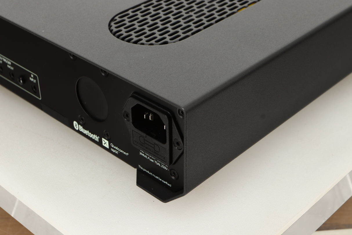 Rear right corner view of a used Roksan Attessa Integrated Amplifier in Black finish