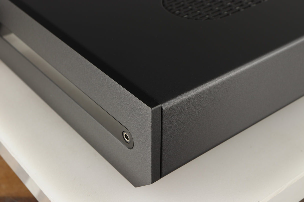 Front right corner of a used Roksan Attessa Integrated Amplifier in a black finish