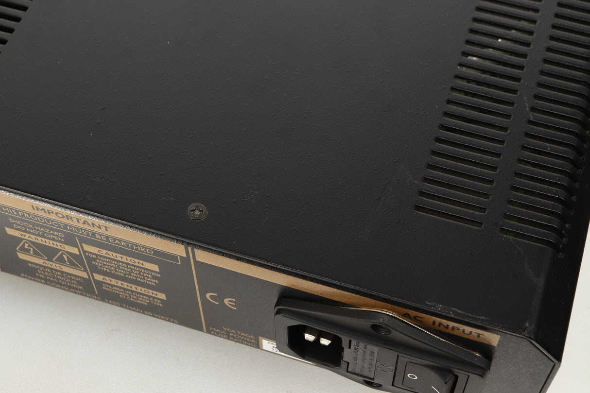 Close up view of a used Roksan Caspian M Series-1 Dual Mono Pre Amplifier in Silver finish showing scratching on the back corner