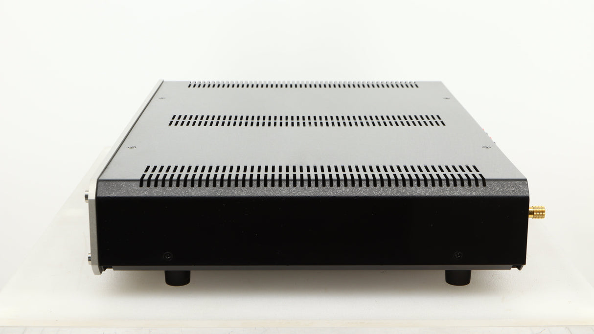 Right side view of a used Roksan Caspian MSeries-1 Power Amplifier in a silver finish