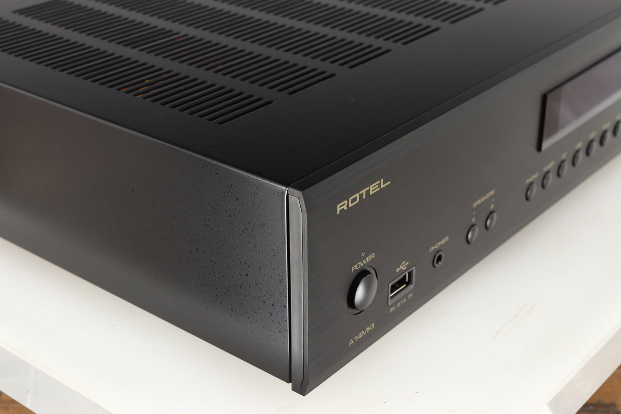 Front left corner of a used Rotel A14 MKII Integrated Amplifier in a black finish