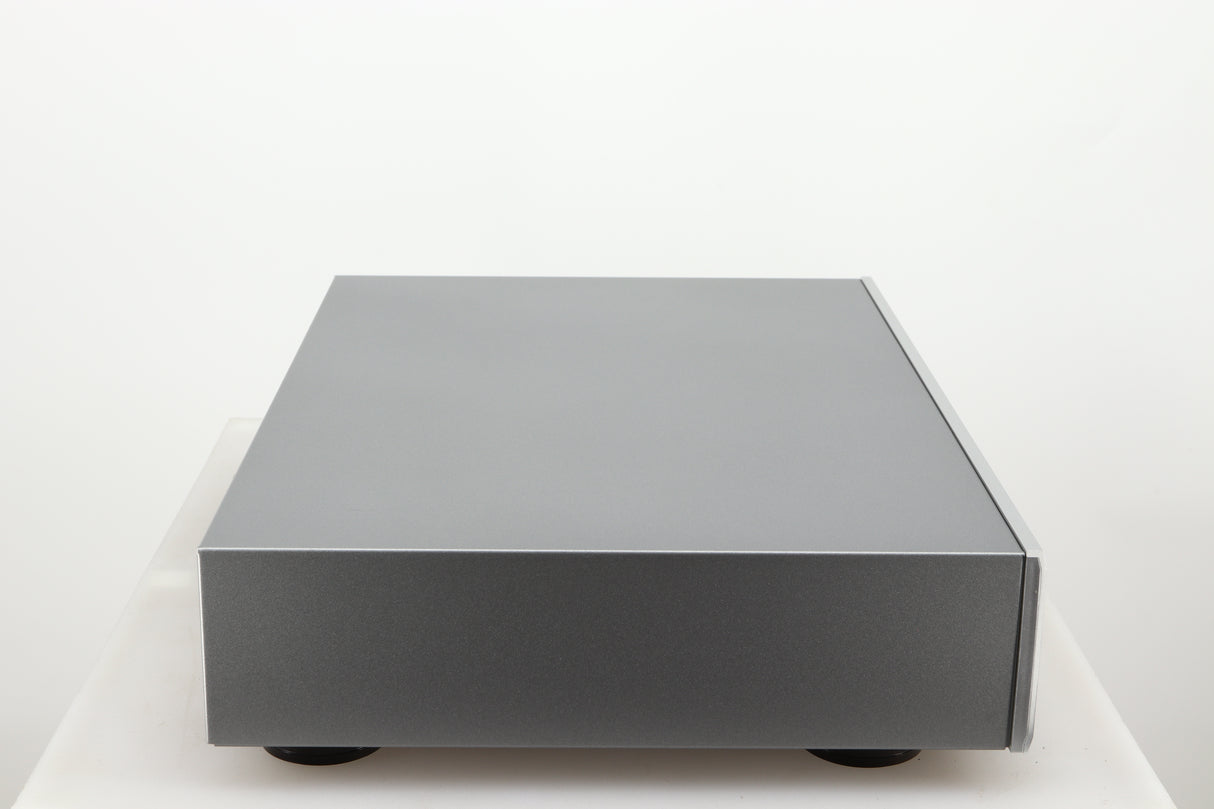 Left side view of a used Rotel CD11 Tribute CD Player in a silver finish