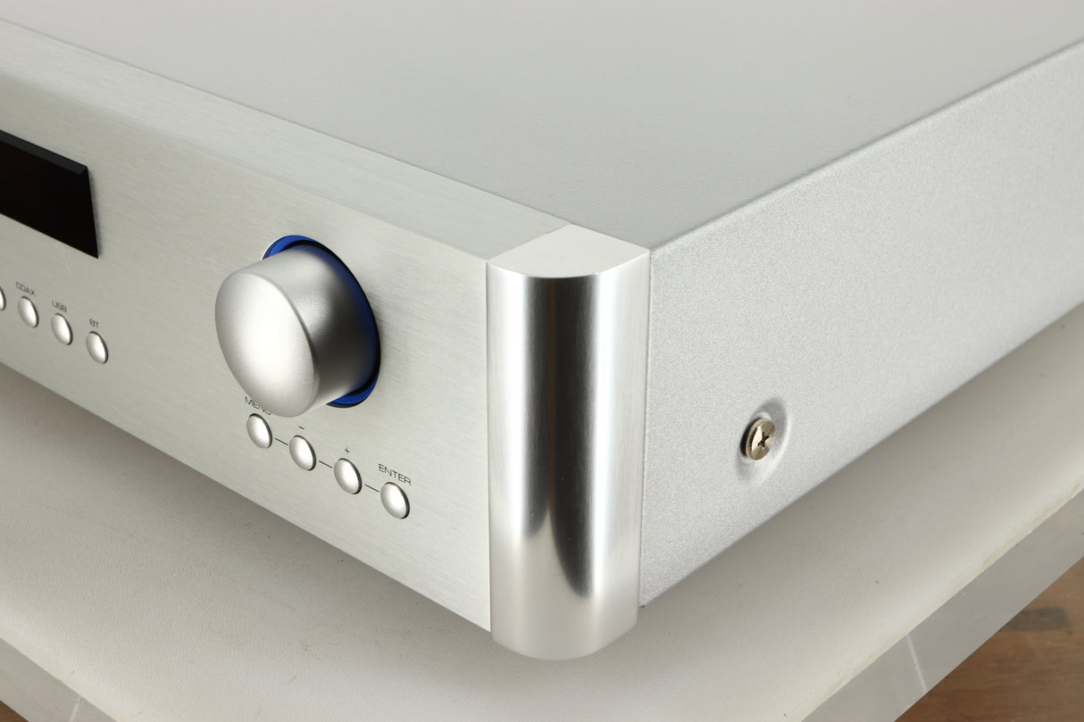 Front right corner view of a used Rotel RC-1572 MKII Pre Amplifier in Silver finish