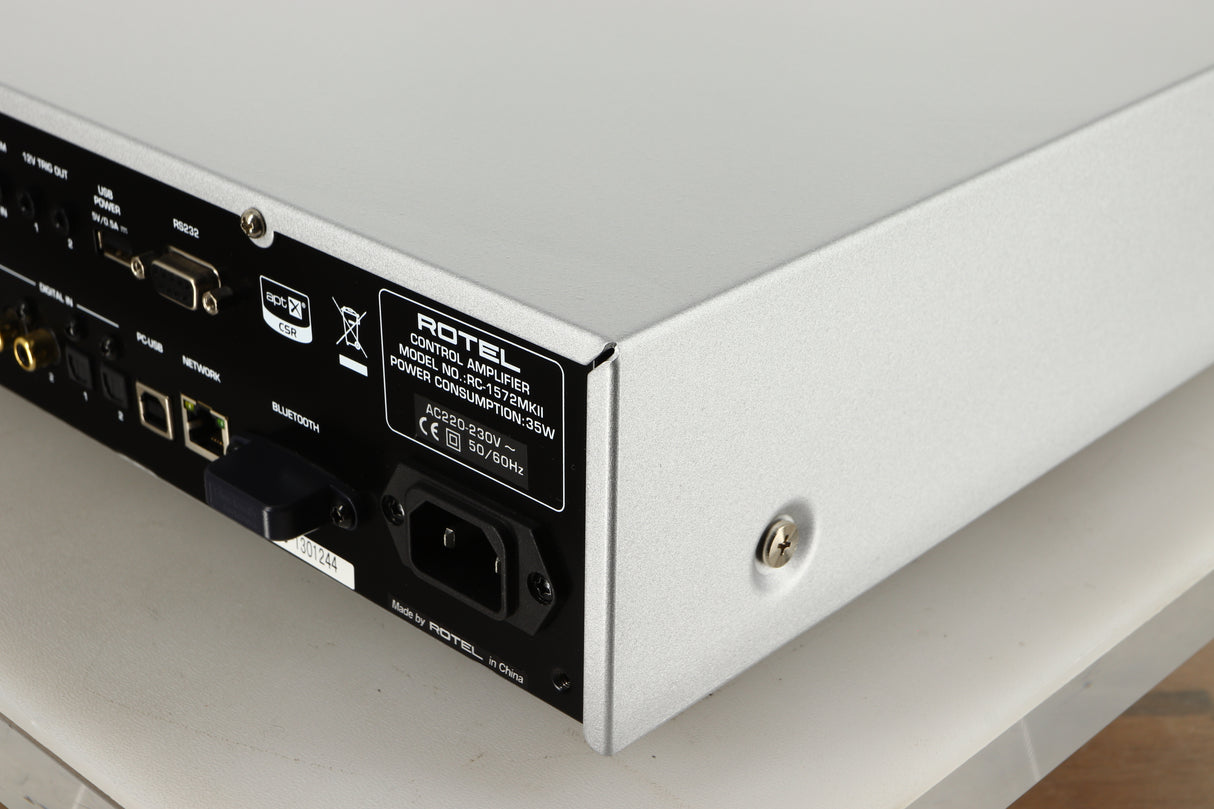 Rear right corner view of a used Rotel RC-1572 MKII Pre Amplifier in Silver finish