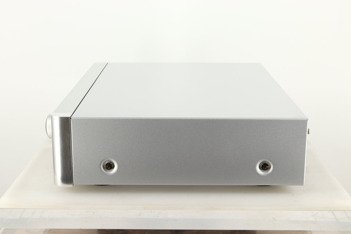 Side view of a used Rotel RC-1572 MKII Pre Amplifier in Silver finish