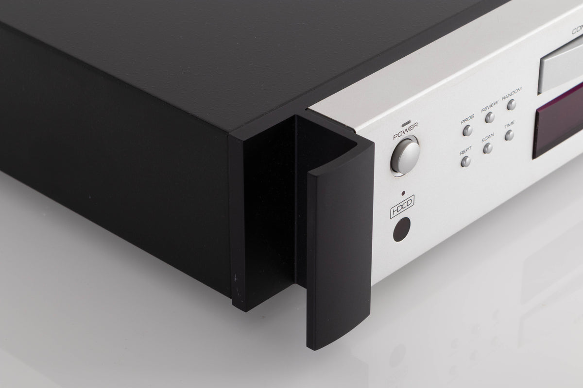 Front left corner view of a used Rotel RCD-1072 CD Player in Silver