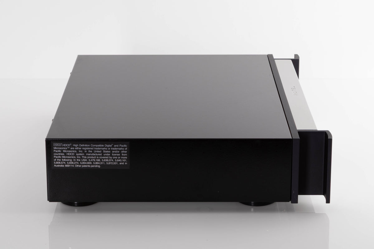 Side view of a used Rotel RCD-1072 CD Player in Silver