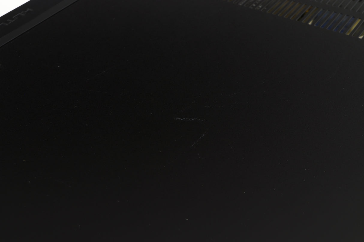 Close up of a used Rotel RSP-1066 Pre Amplifier / Processor in a black finish showing some marks on top
