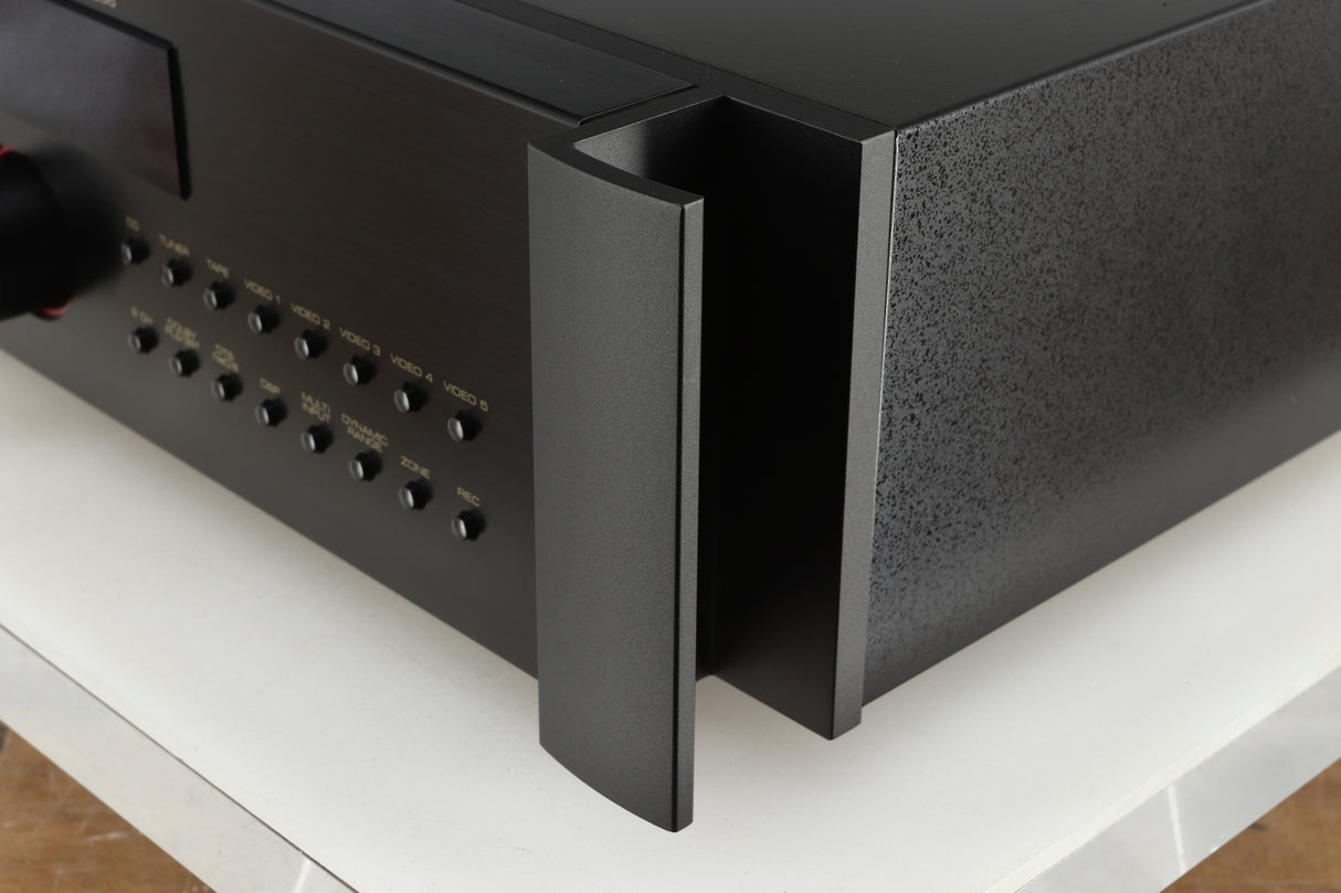 Front right corner of a used Rotel RSP-1066 Pre Amplifier / Processor in a black finish
