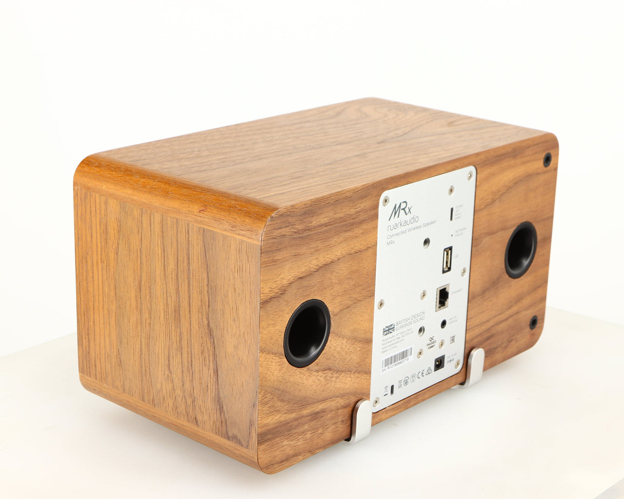 Rear right corner of a used Ruark MRX Wireless Speaker in a walnut finish