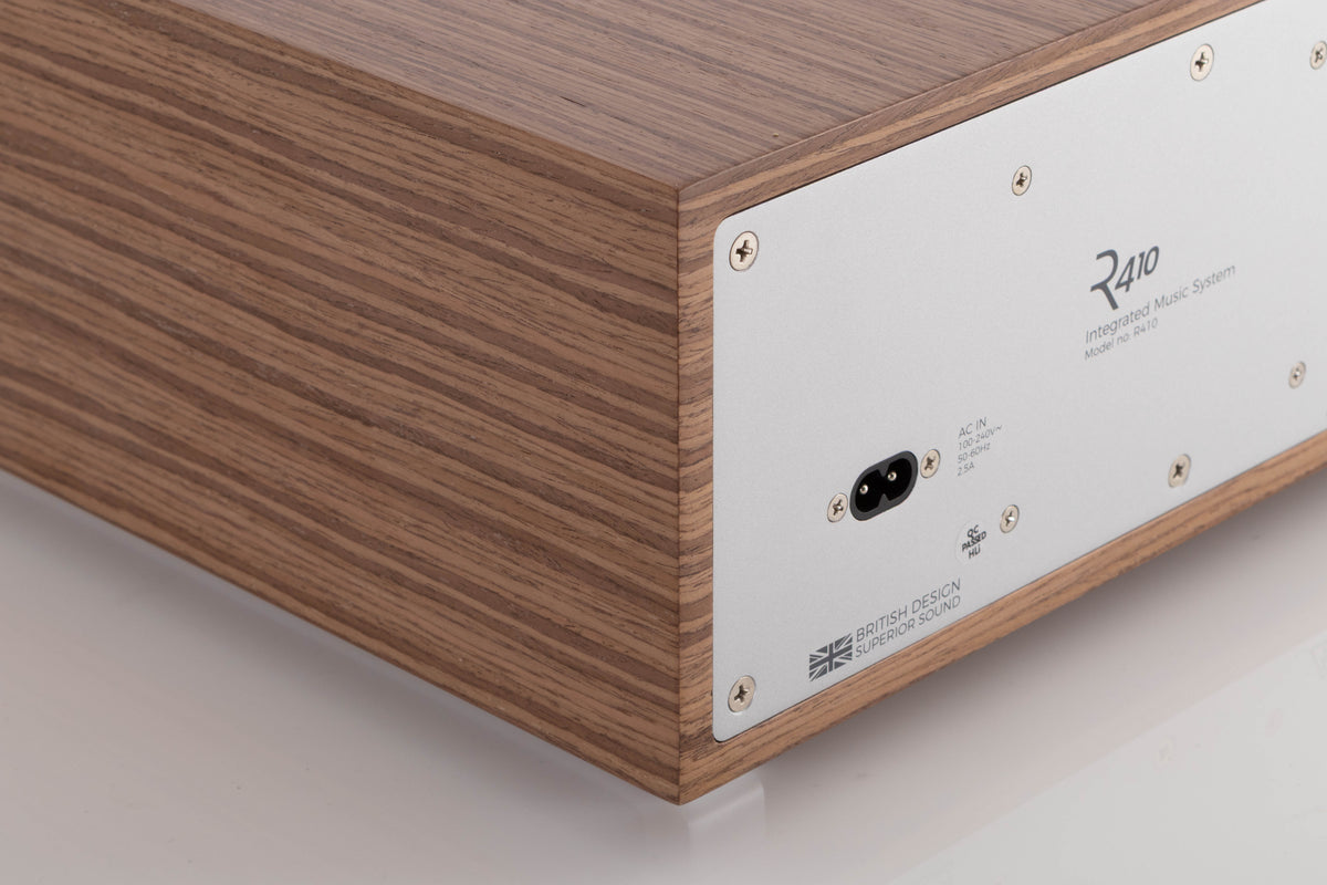 Rear left corner view of a used Ruark R410 Integrated Music System in Fused Walnut