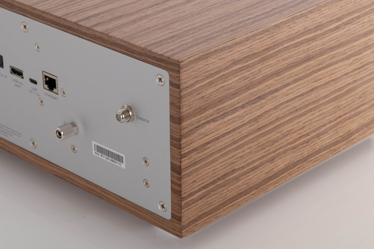 Rear right corner view of a used Ruark R410 Integrated Music System in Fused Walnut