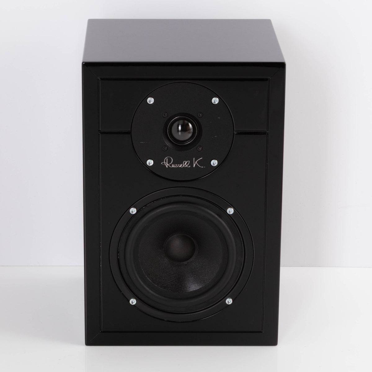 Front view of a used Russell K RED50 Standmount Speaker in a Piano Black finish
