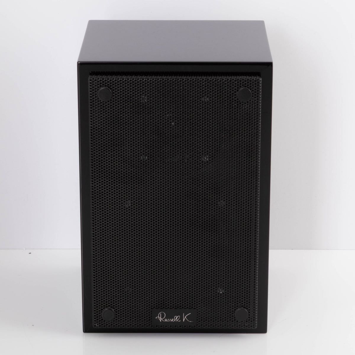 Front view of a used Russell K RED50 Standmount Speaker in a Piano Black finish showing Grille