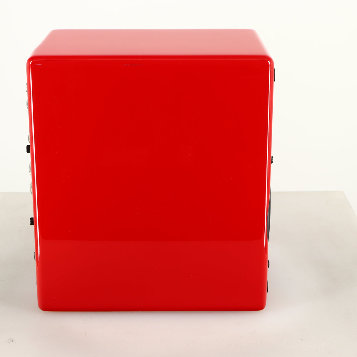Left side view of a used Scansonic S5 BT Active Bluetooth Standmount Speakers in a red finish