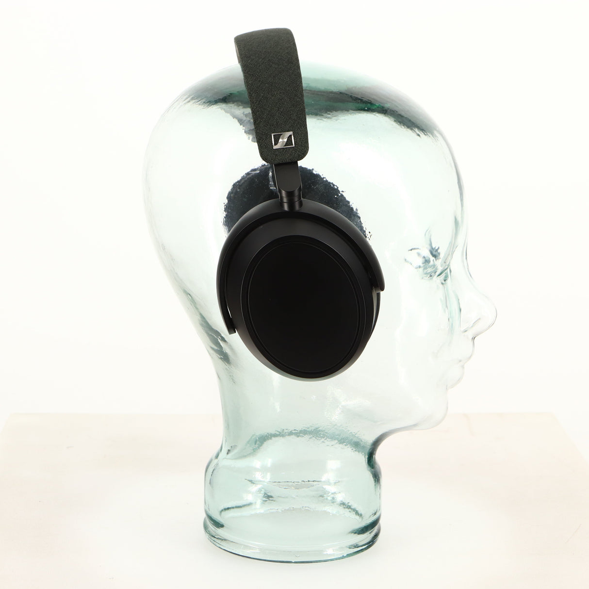 Left side view of used Sennheiser Momentum 4 Wireless Headphones in a black finish