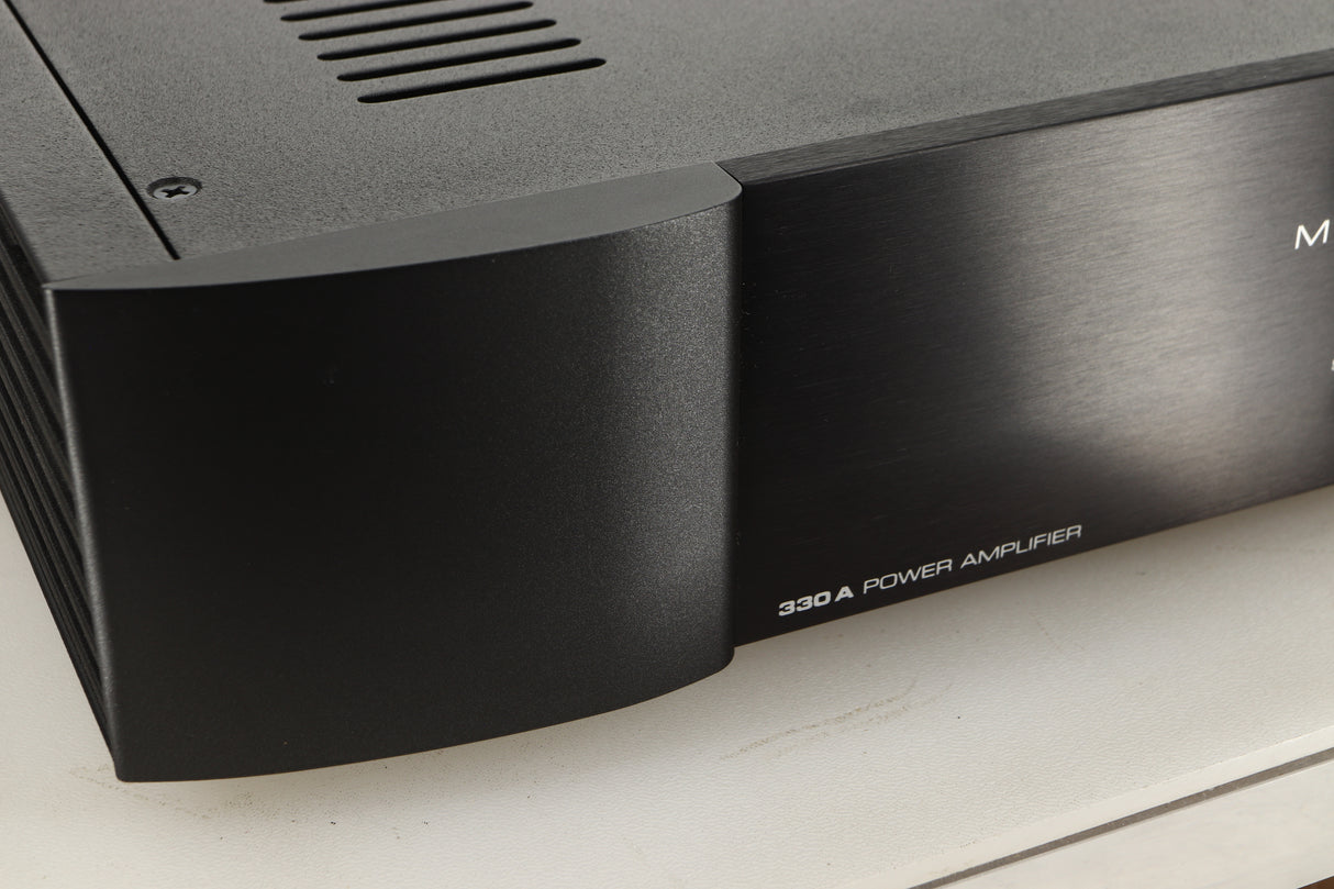 Close up view of a used Sim Audio Moon 330A Power Amplifier in Black finish