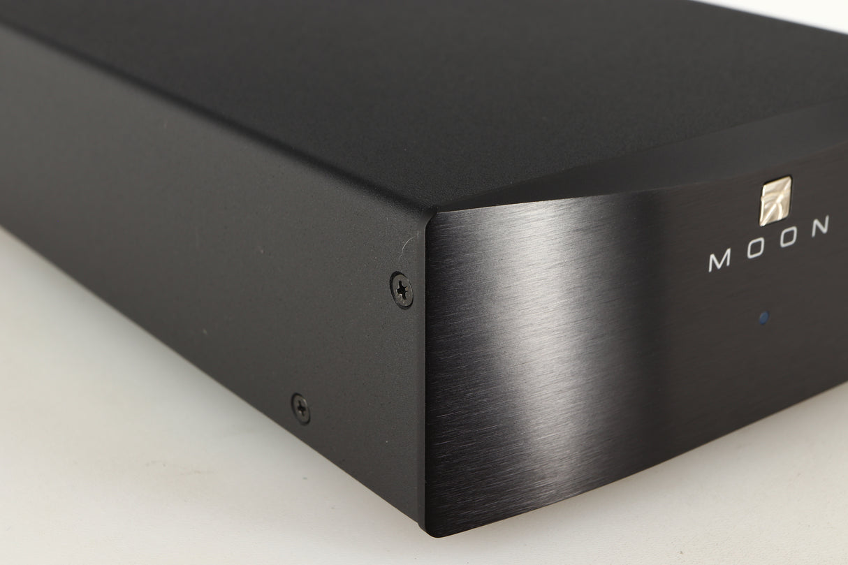 Front left corner of a used Simaudio Moon 310LP Phono Pre Amplifier in a black finish
