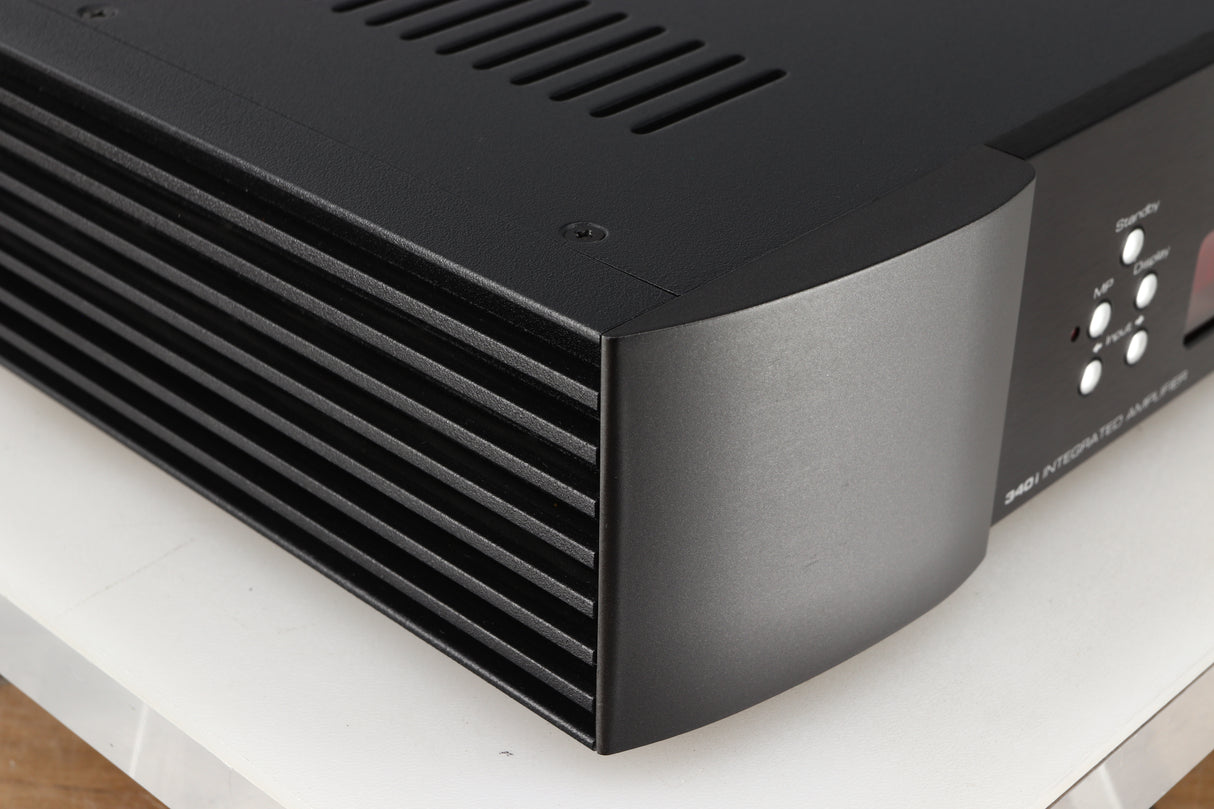 Front left corner of a used Simaudio Moon 340i D3PX Integrated Amplifier in a black finish