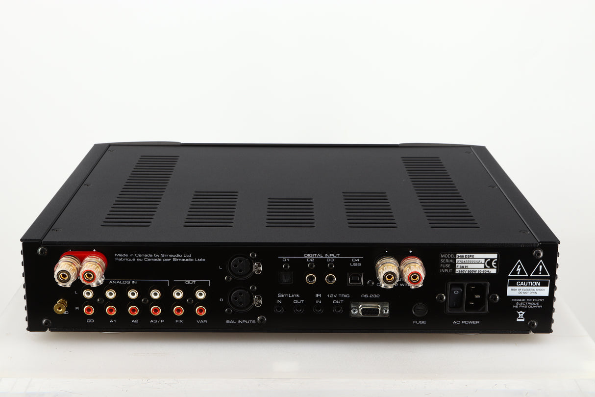 Rear view of a used Simaudio Moon 340i D3PX Integrated Amplifier in a black finish showing Phono Inputs and Outputs, Mains Input, Optical Input and Speaker Inputs