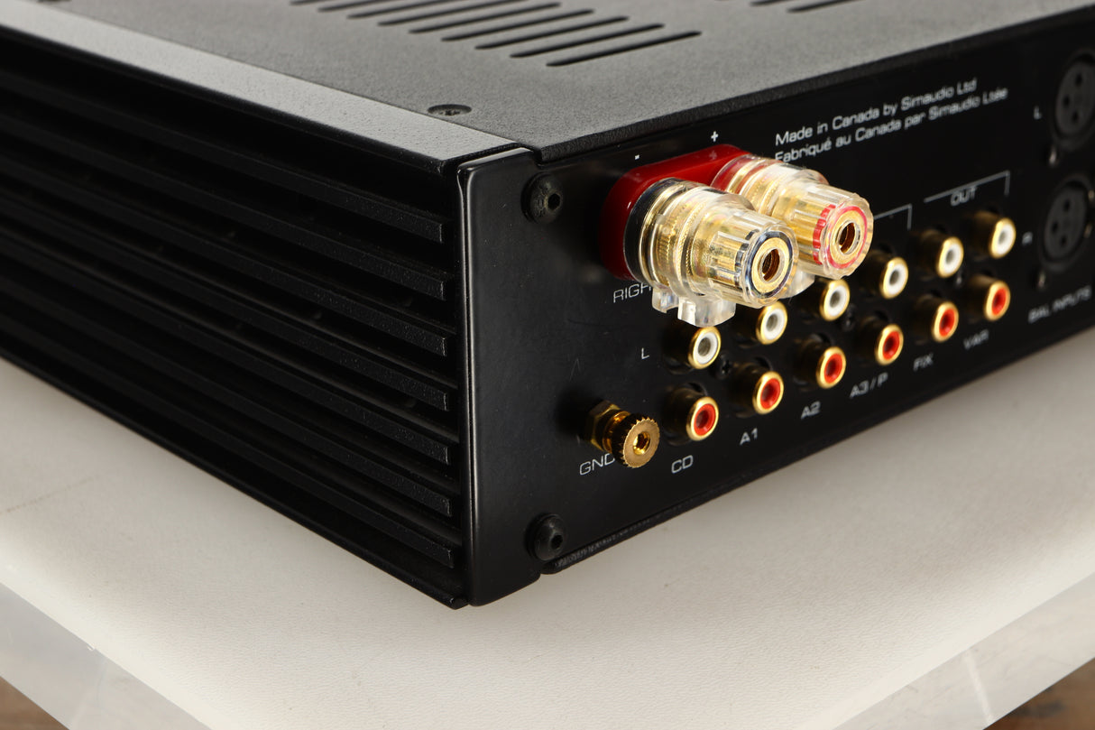 Rear left corner view of a used SimAudio Moon 340i X Integrated Amplifier in Black/Silver finish