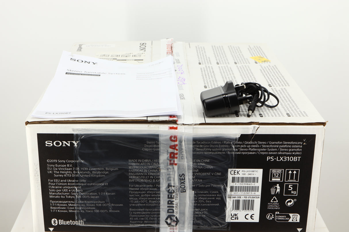 Box for a used Sony PS-X301BT/C Turntable in a black finish showing PSU and Manual