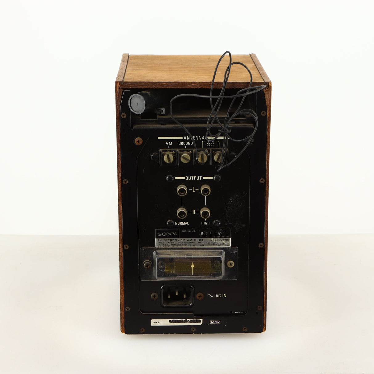 Rear view of a used Sony ST-88 Tuner in an oak finish showing Mains Input and Phono Outputs