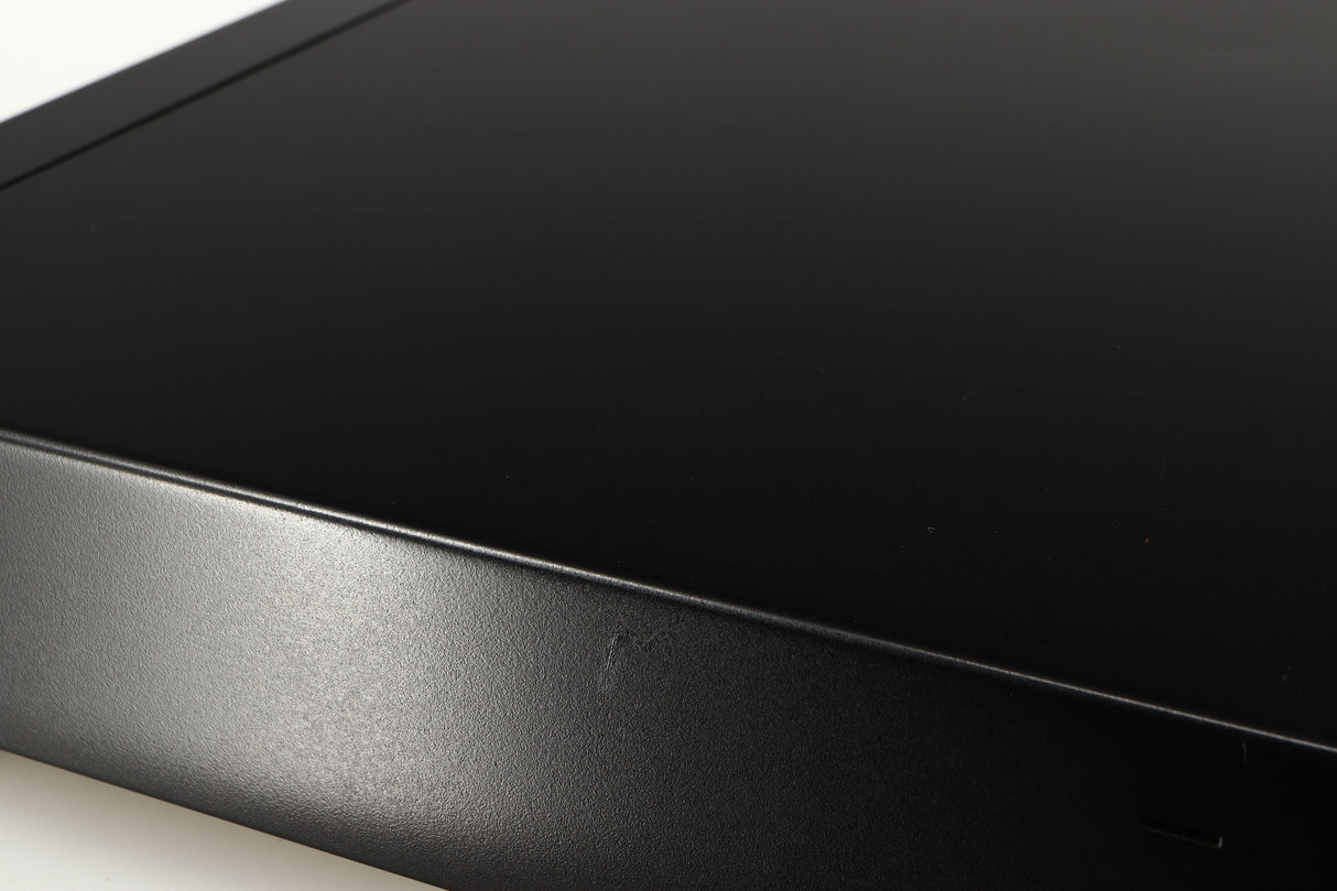 Close up of a used Sony ST-S570ES FM/AM Tuner in a black finish showing scratch on right side