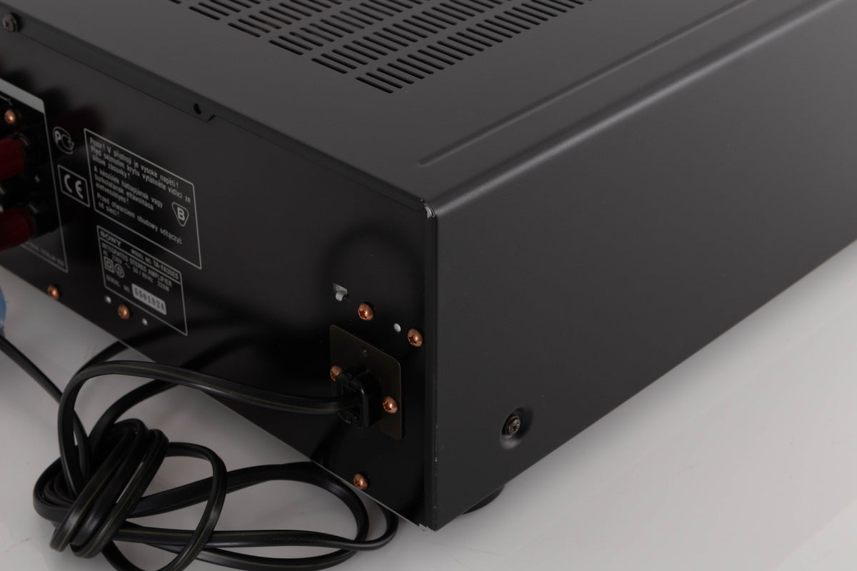 Rear left corner of a used Sony TA-FA30ES Integrated Amplifier in a Black finish